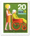 Stamp: Pflegehilfe: Frau im Rollstuhl