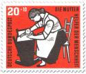 Briefmarke: Mutter mit Kind in einer Wiege