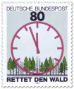Briefmarke: Saurer Regen: Wald mit ablaufender Uhr