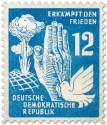 Briefmarke: Atompilz, Hand und Taube