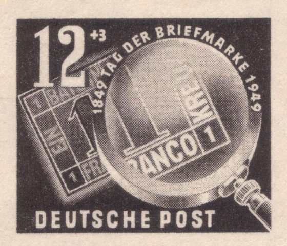 Briefmarke: Debria 1949 - Ein Kreuzer und Lupe